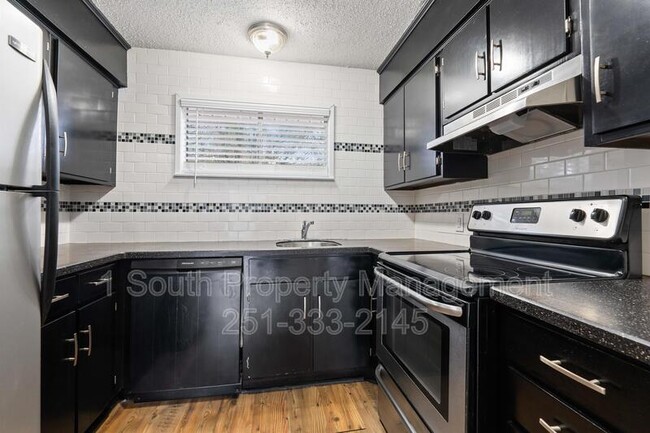 Foto del edificio - 6527 Old Shell Rd