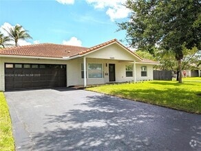 Building Photo - 10680 NW 6th Ct