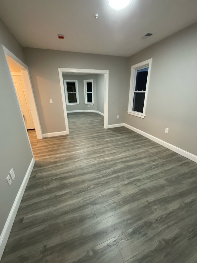 Diningroom looking into living room - 52 Woolson St