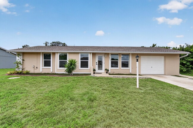 Building Photo - 1057 Tropical Ave NW