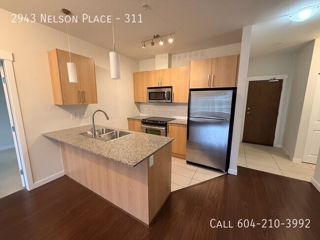 Photo du bâtiment - Spacious 2 Bedroom Condo