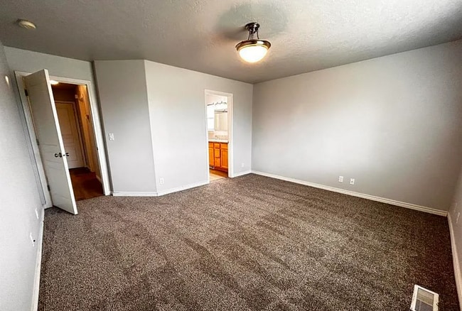 Primary bedroom - 8455 W Harmonica Way
