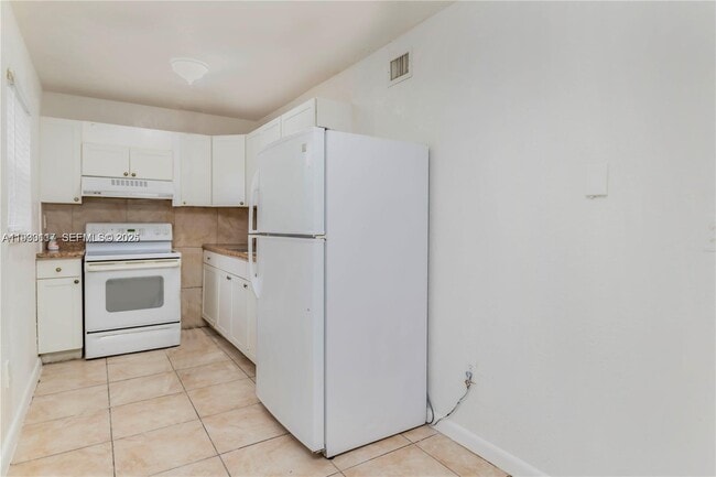 Building Photo - 1123 NW 27th Ave