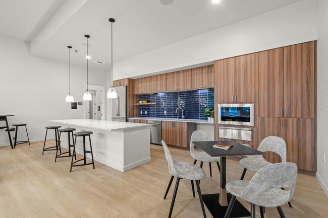 Gather with friends in thoughtfully planned amenity spaces, expansive clubroom. We've worked hard to curate amenities that elevate your lifestyle. - Modera Lacey