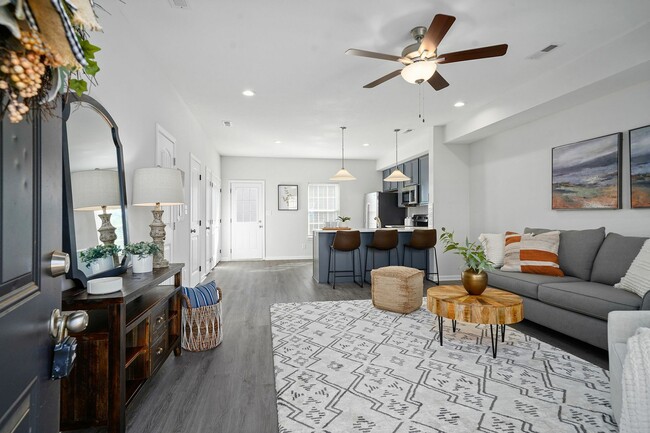 Spacious Living Room with Wood Style Flooring - Victory Place