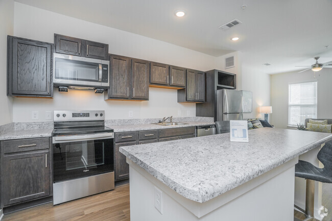 1BR, 1BA - 650SF - Kitchen - Alexis Parc 55+ Active Adult