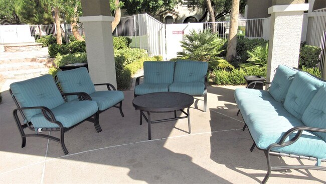Building Photo - Two bedroom two bathroom ground floor condo in gated Chateau Nouveau with no carpeting!