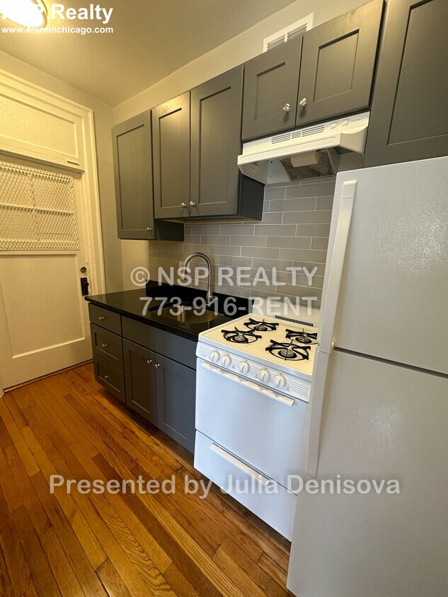 Building Photo - 1369 W Estes Ave