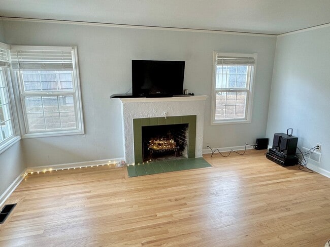 Building Photo - University Park Beautifully Renovated Home with Hardwoods, Heat Pump (A/C) and Garage