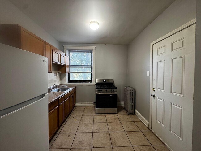 Foto del edificio - 2664 E 77th St