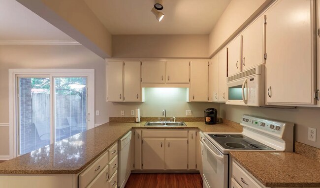 Building Photo - "Charming 2-Bed Haven on Long Boulevard - ...