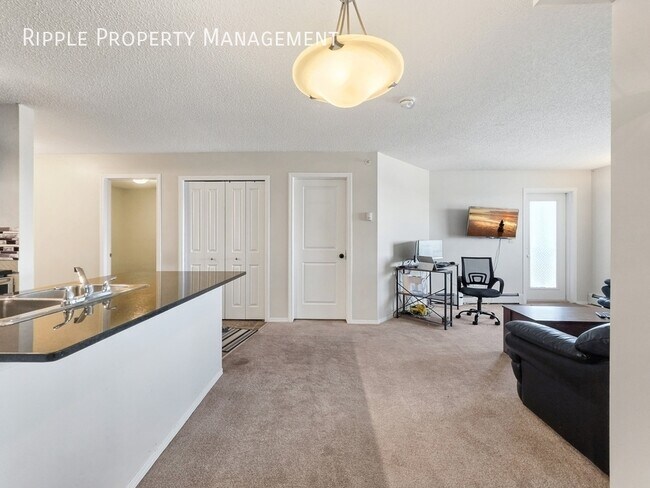 Photo du bâtiment - SPACIOUS 3 BEDS, 2 BATHS CONDO | PRIME SADDLE RIDGE LOCATION