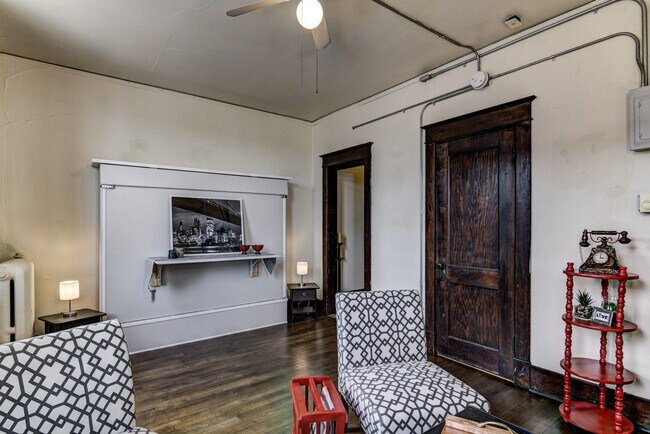 Murphy bed folds up against wall, and desk folds up - 711 4th St E