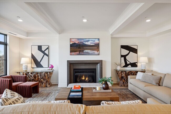 A handsome gas fireplace anchors one end of the living room - 511 2nd St