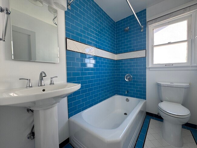 Fresh and bright retro-modern bathroom - 554 E Cypress Ave