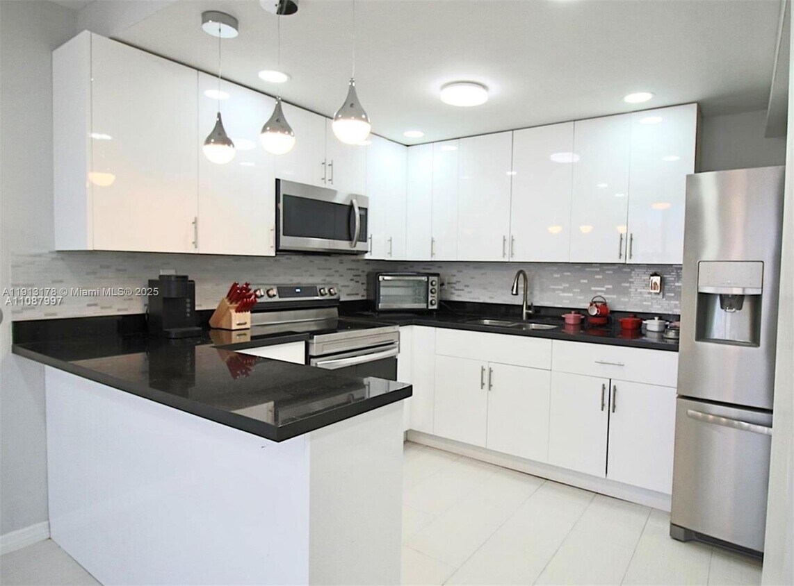 Foto principal - 3865 W 9th Ave