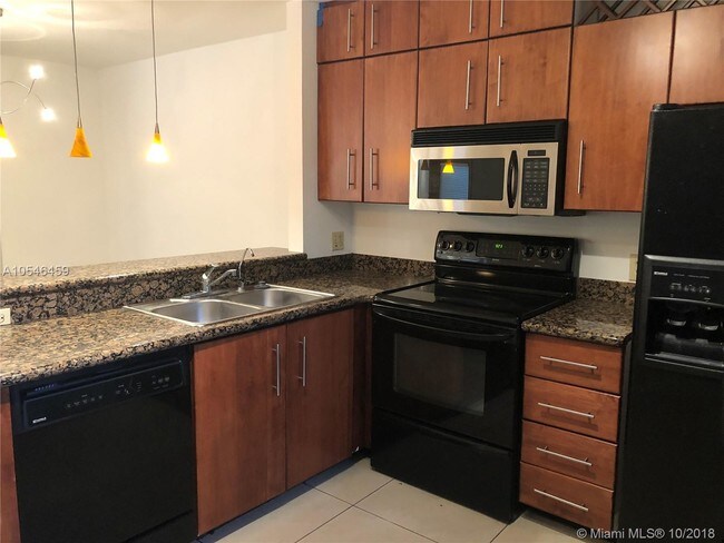 Foto del edificio - MARINER VILLAGE TH CONDO