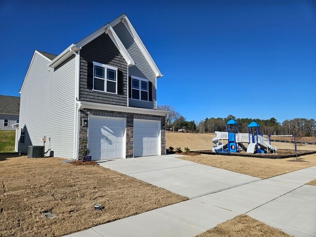 Building Photo - Wonderful Home! 4br 2.5Ba w/ 2 car garage!...