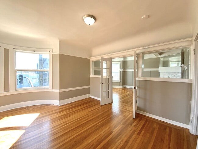 Building Photo - 1BR W/ Bonus Room. In-Unit LAUNDRY! DISHWASHER! PARKING AVAILABLE!