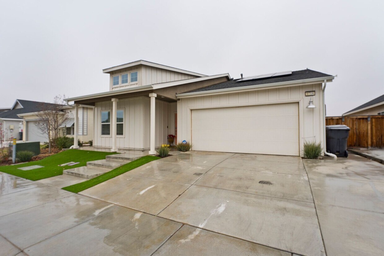 Primary Photo - 4 bed 2 bath home with solar panels