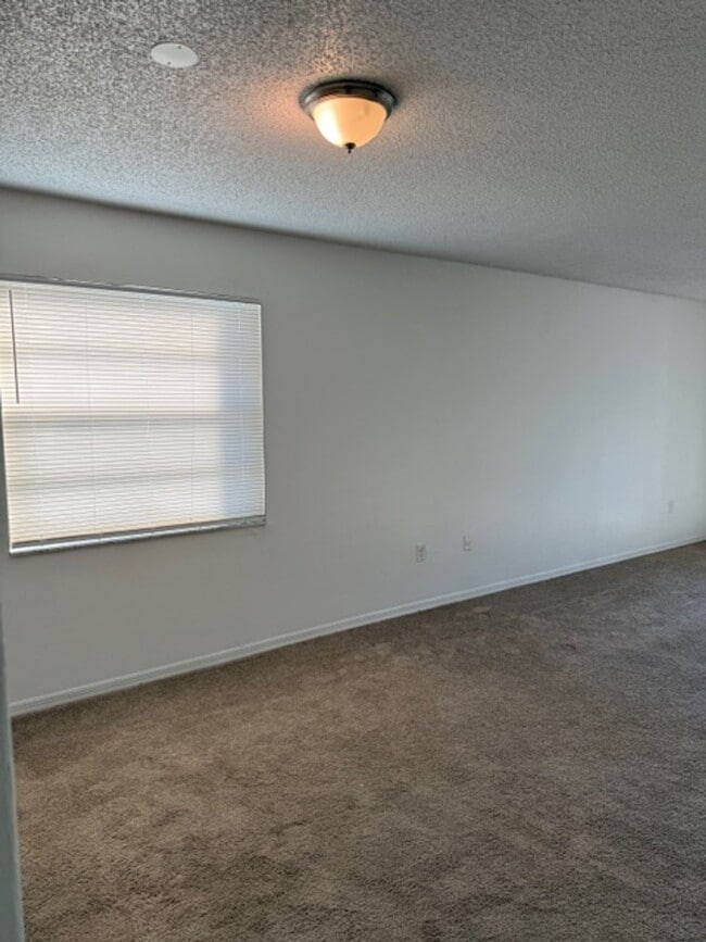 Building Photo - CORAL GARDENS 2 BEDROOMS CONDO