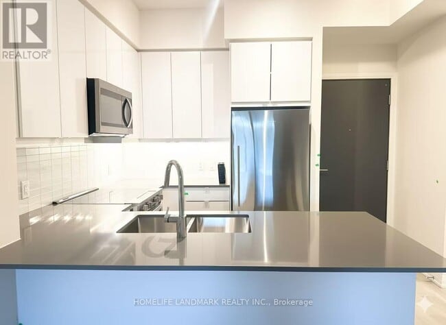 Building Photo - 3260 Sheppard Ave E