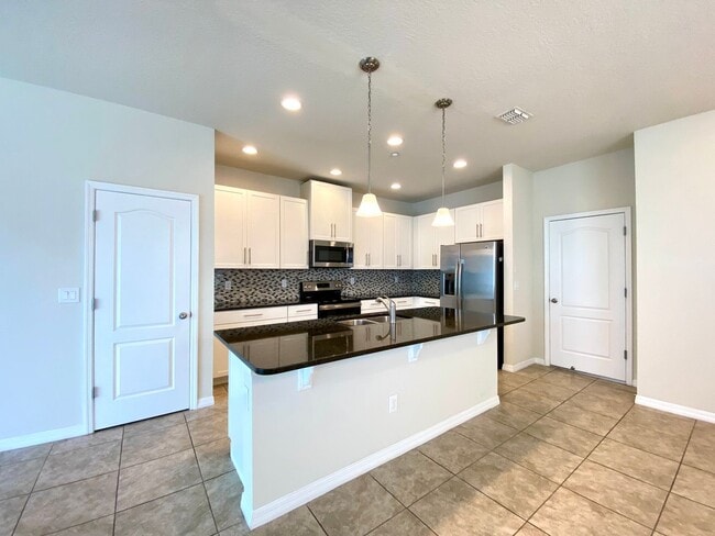 Building Photo - 3/2.5 Town Home in Winter Park with 2-Car ...
