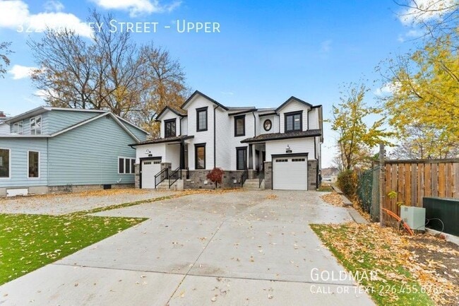 Building Photo - Stunning 2 level home with water views ava...
