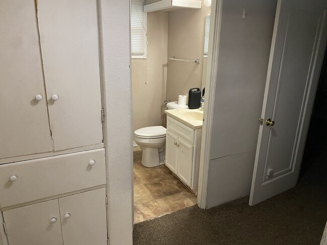 Hall, storage, and bathroom - 512 Grand Ave