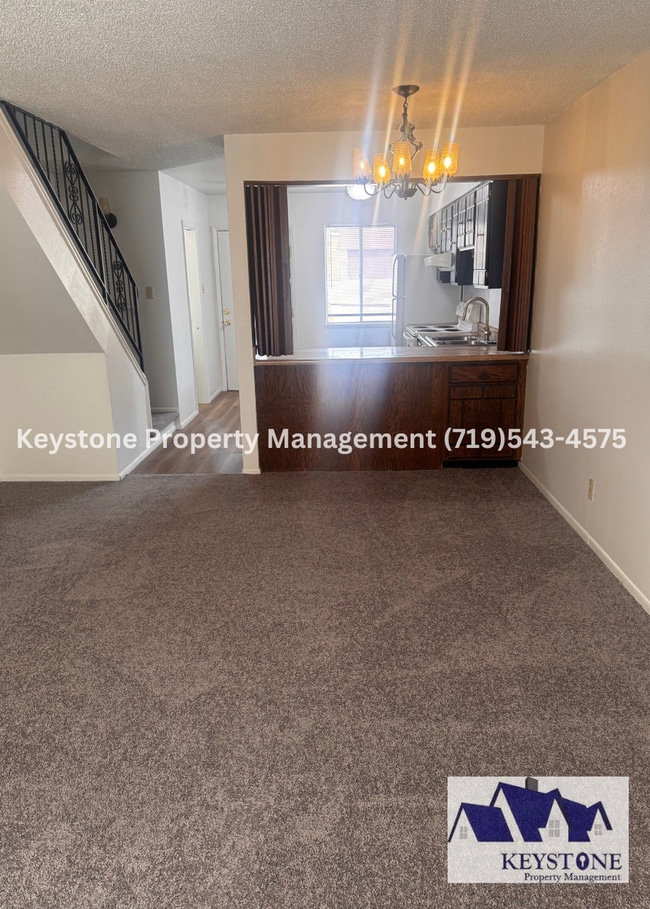 Building Photo - Updated 2 Bedroom Belmont Townhome with Attached Garage & Fenced Yard $1300/$1300