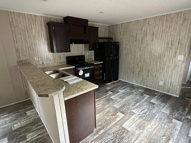 Foto del edificio - 55009 Hill Rd