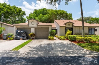 Building Photo - 18615 Breezy Palm Way