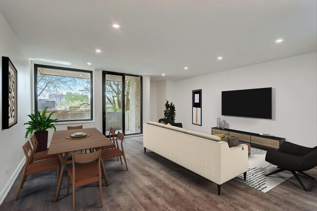 Large living area has space for living and full dining table. - 240 M St SW