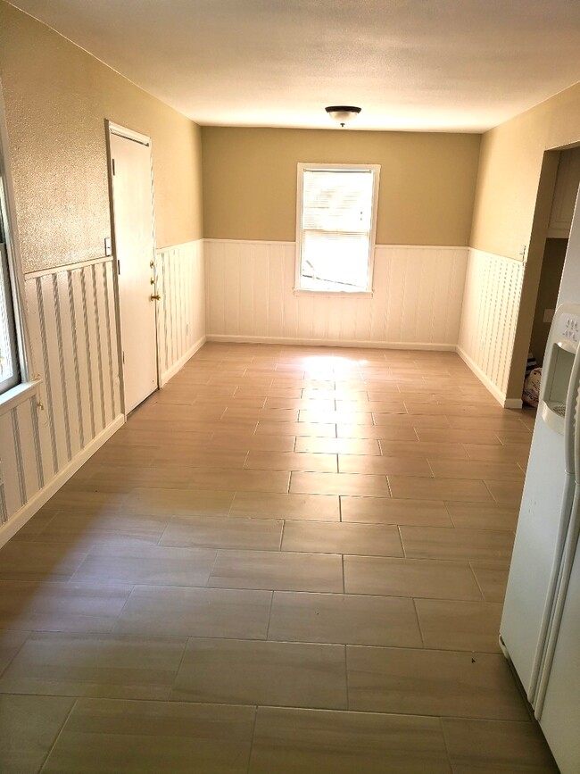 New tile in oversized eat-in kitchen - 4244 Asbury Ave