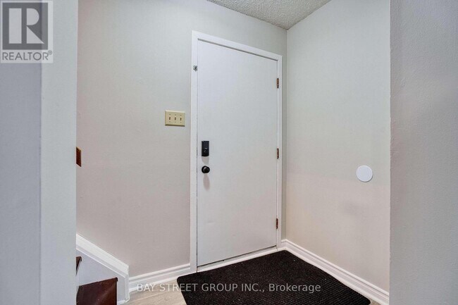 Photo du bâtiment - 1 Ranchwood Crescent