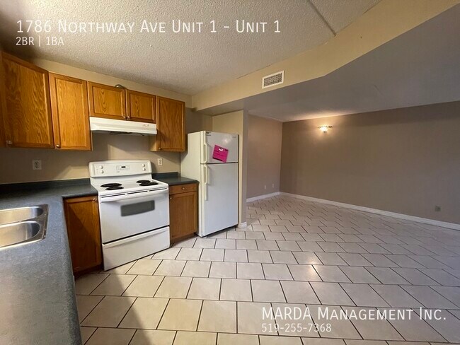 Building Photo - SPACIOUS 2 BED/1 BATH MODERN LOWER LEVEL SUITE! +HYDRO, GAS & WATER!