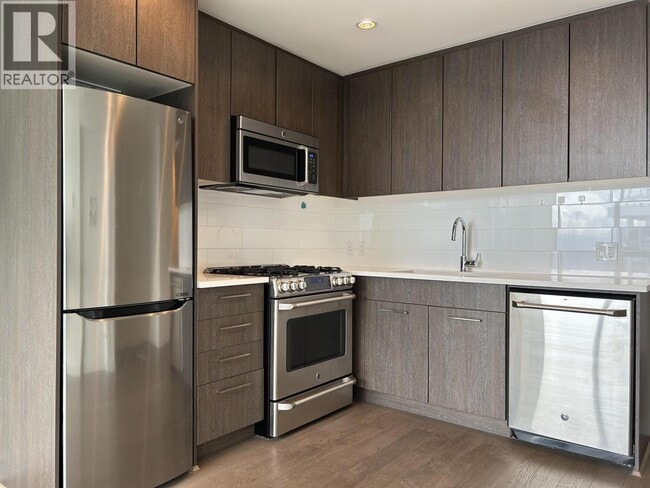 Building Photo - 9060 University Crescent