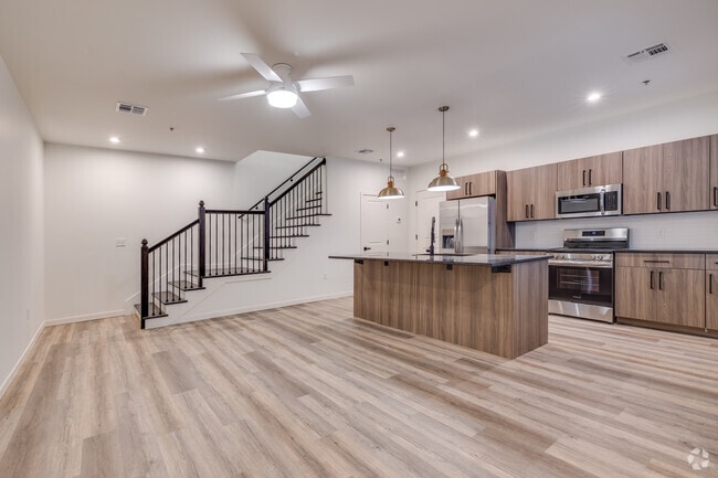 3BR, 2.5BA - 1867SF - Kitchen and Living Area - Reef Townhomes
