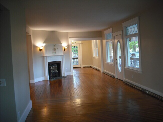 open floor plan living room into dining room - 21 Memorial Dr