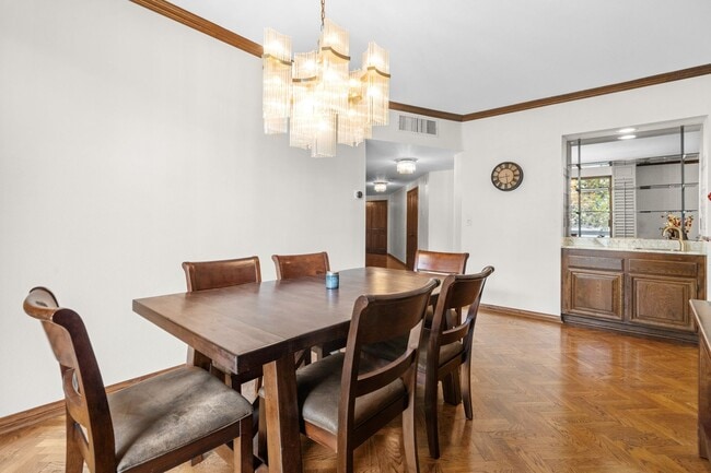 Building Photo - Elegant Corner Condo with Spacious Interiors