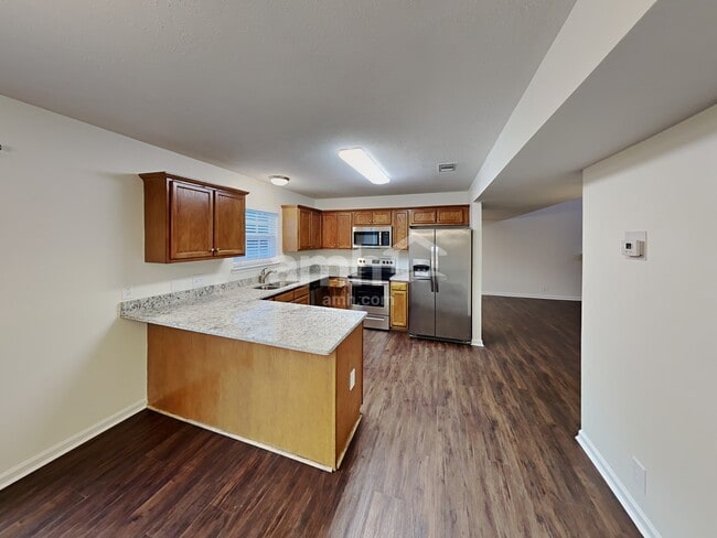 Building Photo - 7400 E Winchester Dr