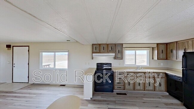 Building Photo - 9815 N Log Rd