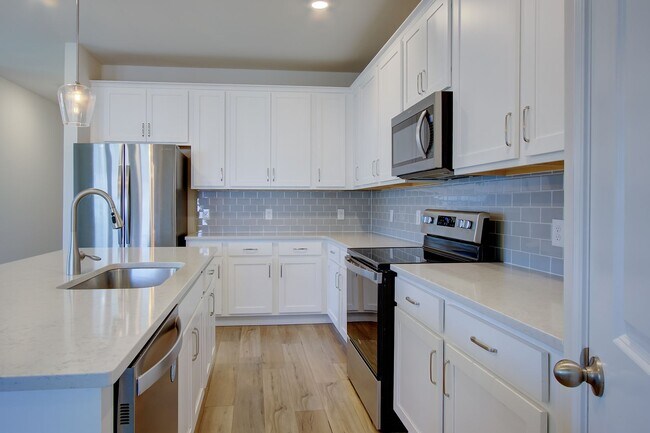 Building Photo - Spacious 4BR Rental with Stunning Kitchen & Covered Patio