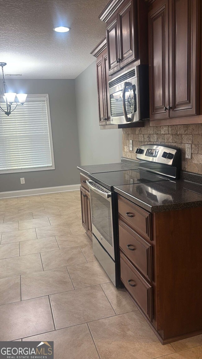 Foto del edificio - 303 S Charity Ln