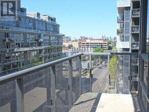 Building Photo - 1030 King St W