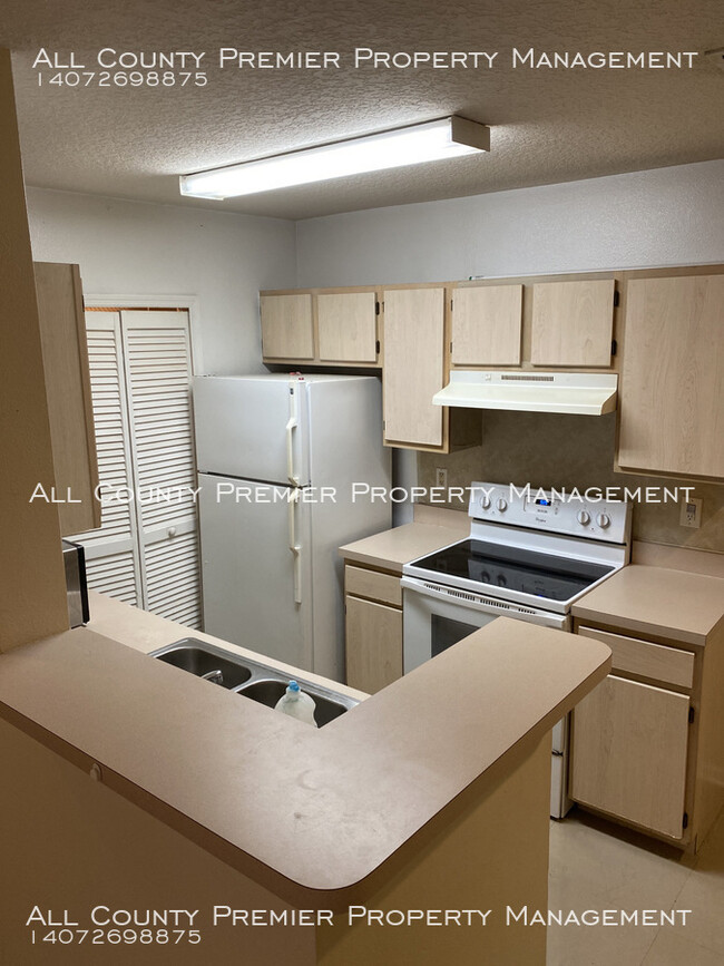 Building Photo - Nice 2 Bedroom 2 Bath Condo! Sunset Lake C...