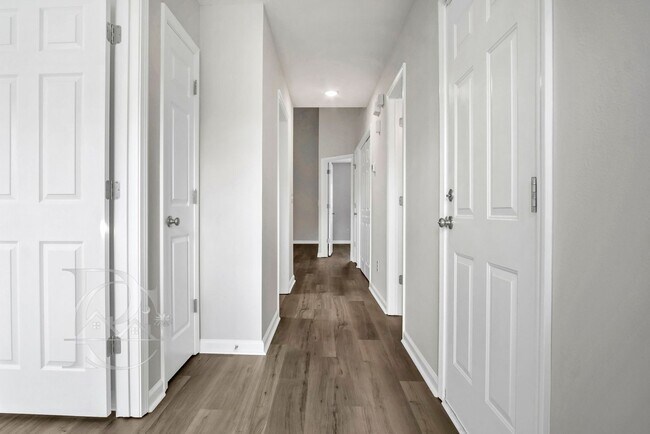 Building Photo - TWO BEDROOM GARDEN HOME IN GATED COMMUNITY