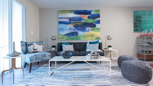 Apartment Living Room with wood floors. - Griffis Belltown