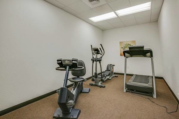 Fitness Room - Manitowoc Place, LLC. Apartments