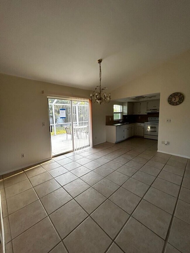 Building Photo - 3 Bedroom with large yard - Cape Coral